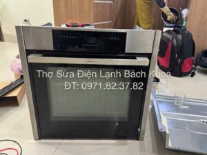 khắc phục lỗi lò vi sóng không mở được cửa tại nhà